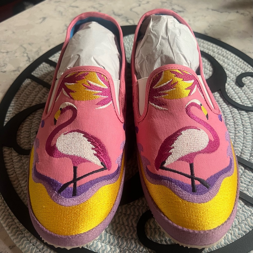 Playful Pink and Yellow Flats with Dynamic Design